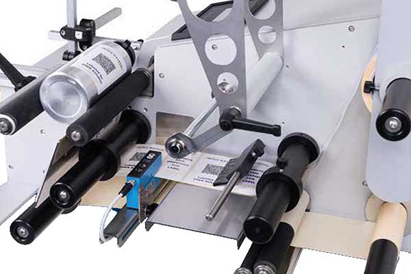 etiquetadora semiautomatica productos cilindricos